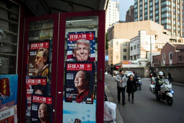 An advertisement in a magazine (top right) features US President-elect Donald Trump on the cover at a news stand in Shanghai, China. (AFP file photo) An advertisement in a magazine (top right) features US President-elect Donald Trump on the cover at a news stand in Shanghai, China. (AFP file photo)