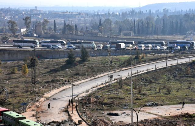 Civilians from the remaining rebel-held pockets of eastern Aleppo are evacuated from the embattled city by bus on December 19, 2016. (AFP Photo) Civilians from the remaining rebel-held pockets of eastern Aleppo are evacuated from the embattled city by bus on December 19, 2016. (AFP Photo)