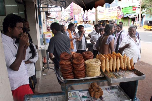 Customers at the OPS tea stall at Periyakulam. (P Mahendran/Hindustan Times)