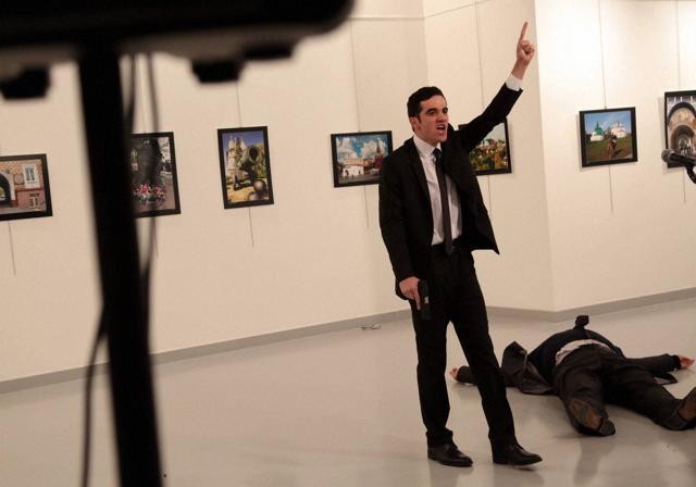 The man shouts “Allahu Akbar” (”God is greatest”) and then talks in Arabic about pledging allegiance to jihad in Arabic, the footage shows. He then switches to Turkish, shouting: “Don’t forget about Syria, don’t forget about Aleppo. All those who participate in this tyranny will be held accountable.” (AP) The man shouts “Allahu Akbar” (”God is greatest”) and then talks in Arabic about pledging allegiance to jihad in Arabic, the footage shows. He then switches to Turkish, shouting: “Don’t forget about Syria, don’t forget about Aleppo. All those who participate in this tyranny will be held accountable.” (AP)