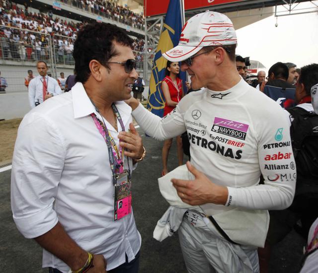 Michael Schumacher, in conversation with Sachin Tendulkar during the Indian Grand Prix in 2011. (AFP) Michael Schumacher, in conversation with Sachin Tendulkar during the Indian Grand Prix in 2011. (AFP)