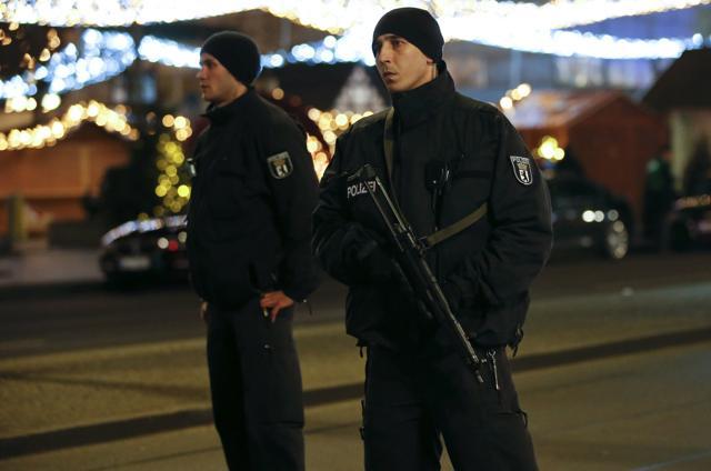 German police officers secure the site with machine guns. (REUTERS) German police officers secure the site with machine guns. (REUTERS)