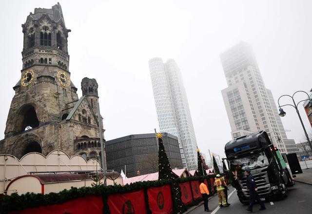 A truck that crashed into a Christmas market near the Kaiser-Wilhelm-Gedaechtniskirche (Kaiser Wilhelm Memorial Church) in Berlin is pictured on December 20, 2016. German police said they were treating as "a probable terrorist attack" the killing of 12 people when the speeding lorry cut a bloody swath through the packed Berlin Christmas market. (AFP Photo) A truck that crashed into a Christmas market near the Kaiser-Wilhelm-Gedaechtniskirche (Kaiser Wilhelm Memorial Church) in Berlin is pictured on December 20, 2016. German police said they were treating as "a probable terrorist attack" the killing of 12 people when the speeding lorry cut a bloody swath through the packed Berlin Christmas market. (AFP Photo)