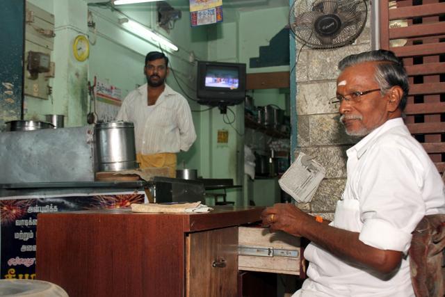 Vijayan at the cash register of his own Relax Canteen. (P Mahendran/Hindustan Times) Vijayan at the cash register of his own Relax Canteen. (P Mahendran/Hindustan Times)