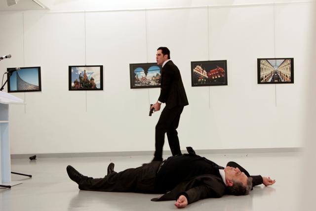 (GRAPHIC CONTENT) Russian Ambassador to Turkey Andrei Karlov lies on the ground after he was shot dead at an art gallery in Ankara, Turkey. (Reuters Photo) (GRAPHIC CONTENT) Russian Ambassador to Turkey Andrei Karlov lies on the ground after he was shot dead at an art gallery in Ankara, Turkey. (Reuters Photo)