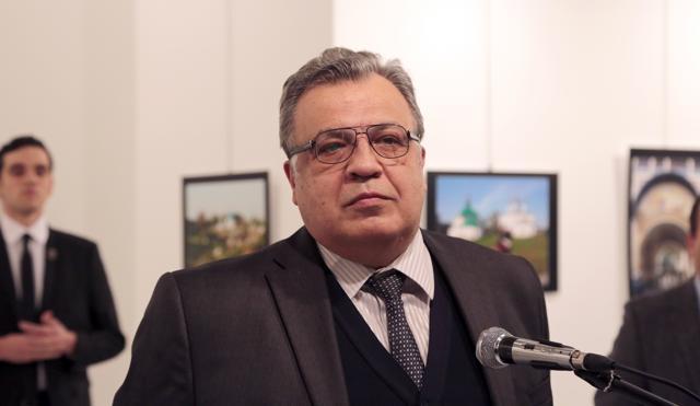 The Russian Ambassador to Turkey, Andrei Karlov, speaks at an art gallery in Ankara. The assailant is seen standing behind the ambassador as he is speaking and then swaggering around the exhibition waving his gun and pointing aggressively into the air. (AP) The Russian Ambassador to Turkey, Andrei Karlov, speaks at an art gallery in Ankara. The assailant is seen standing behind the ambassador as he is speaking and then swaggering around the exhibition waving his gun and pointing aggressively into the air. (AP)