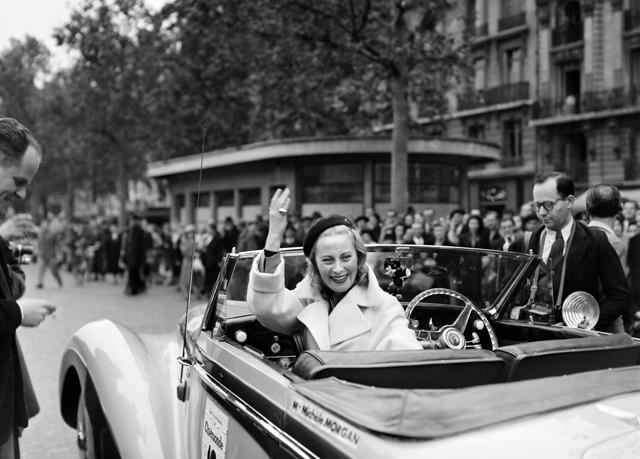(FILE) This file photo taken on July 11, 1948 shows French actor Michele Morgan gesturing in a car during the Rally of Diane, in Paris. (AFP) (FILE) This file photo taken on July 11, 1948 shows French actor Michele Morgan gesturing in a car during the Rally of Diane, in Paris. (AFP)