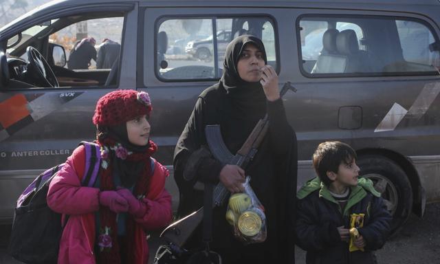 Syrians evacuated from the embattled Syrian city of Aleppo during the ceasefire arrive at a refugee camp in Rashidin, near Idlib, Syria, Tuesday, Dec. 20, 2016. (AP) Syrians evacuated from the embattled Syrian city of Aleppo during the ceasefire arrive at a refugee camp in Rashidin, near Idlib, Syria, Tuesday, Dec. 20, 2016. (AP)
