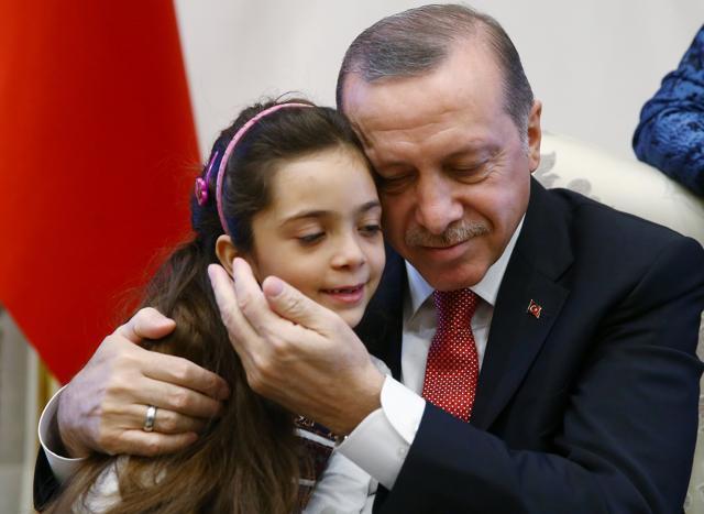 Turkish President Tayyip Erdogan meets with Syrian girl Bana al Abed, known as Aleppo's tweeting girl, at the Presidential Palace in Ankara, Turkey, December 21, 2016. (Reuters) Turkish President Tayyip Erdogan meets with Syrian girl Bana al Abed, known as Aleppo's tweeting girl, at the Presidential Palace in Ankara, Turkey, December 21, 2016. (Reuters)
