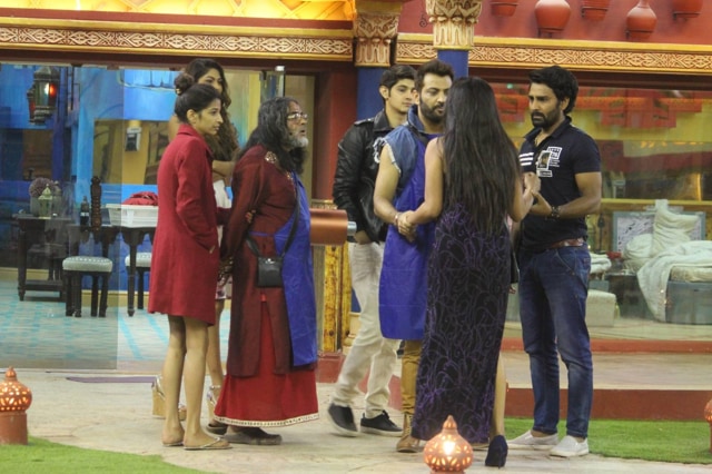 Mona talks to the housemates. (Colors)