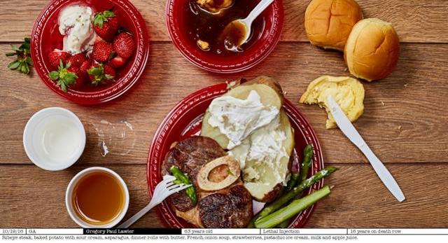 Ribeye steak, baked potato with sour cream, asparagus, dinner rolls with butter, French onion soup, strawberries, pistachio ice cream, milk and apple juice served to 63-years-old from Georgia. (Henry Hargreaves/ayearofkilling.com)