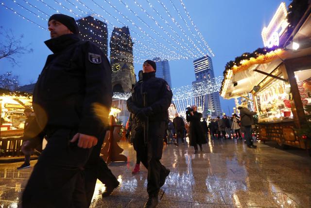 Police patrol at the re-opened Christmas market at Breitscheid square in Berlin, Germany, December 22, 2016, following an attack by a truck which ploughed through a crowd at the market on Monday night. (REUTERS) Police patrol at the re-opened Christmas market at Breitscheid square in Berlin, Germany, December 22, 2016, following an attack by a truck which ploughed through a crowd at the market on Monday night. (REUTERS)