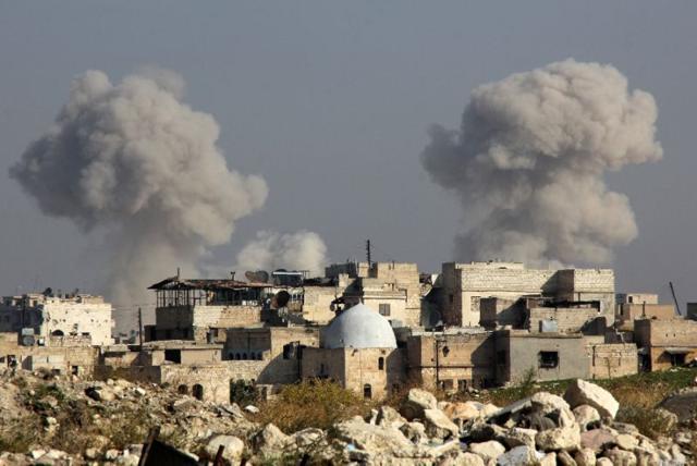 Smoke billows following a reported airstrike by Russian fighter jets on the northern Syrian city of Aleppo. (Reuters Photo) Smoke billows following a reported airstrike by Russian fighter jets on the northern Syrian city of Aleppo. (Reuters Photo)