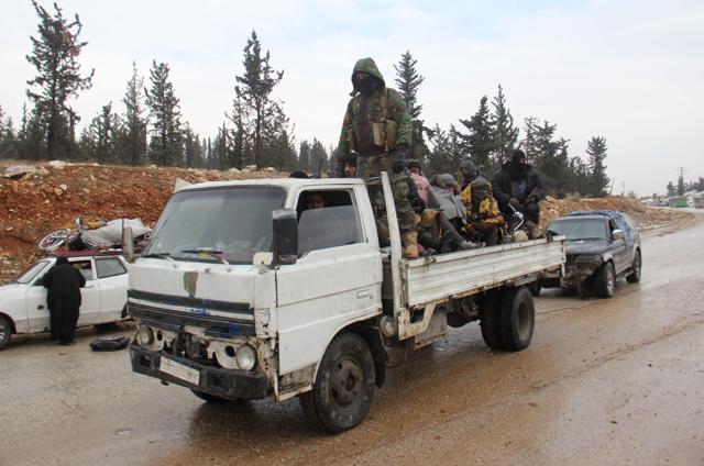 Syrian rebels being evacuated from Aleppo drive through a rebel-held territory near Rashidin. (AFP Photo/Omar Haj Kadour) Syrian rebels being evacuated from Aleppo drive through a rebel-held territory near Rashidin. (AFP Photo/Omar Haj Kadour)
