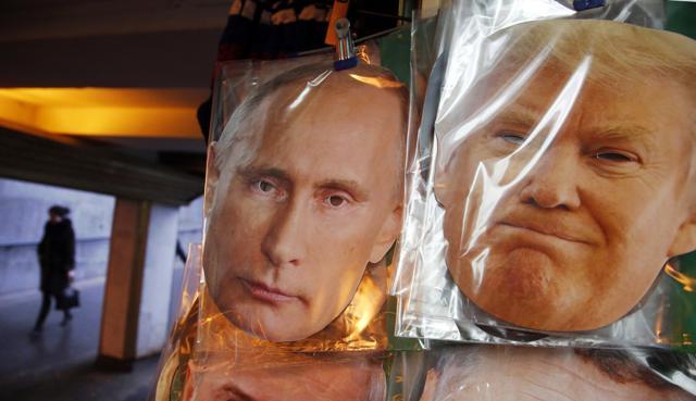 Face masks depicting Russian President Vladimir Putin and US president-elect Donald Trump hang for sale at a souvenir street shop in St.Petersburg, Russia. (AP Photo) Face masks depicting Russian President Vladimir Putin and US president-elect Donald Trump hang for sale at a souvenir street shop in St.Petersburg, Russia. (AP Photo)