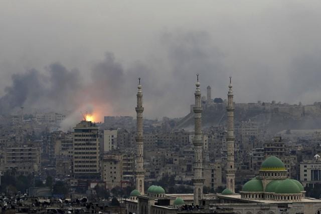 A ball of fire rises following an air strike hits insurgent positions in eastern neighbourhoods of Aleppo. (AP File Photo) A ball of fire rises following an air strike hits insurgent positions in eastern neighbourhoods of Aleppo. (AP File Photo)