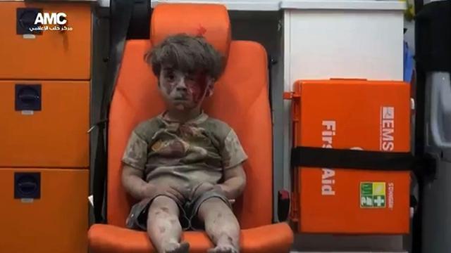 Omran, a four-year-old Syrian boy covered in dust and blood, in an ambulance after being rescued from the rubble of a building hit by an air strike in the rebel-held Qaterji neighbourhood of the northern Syrian city of Aleppo in August. (AFP file photo) Omran, a four-year-old Syrian boy covered in dust and blood, in an ambulance after being rescued from the rubble of a building hit by an air strike in the rebel-held Qaterji neighbourhood of the northern Syrian city of Aleppo in August. (AFP file photo)