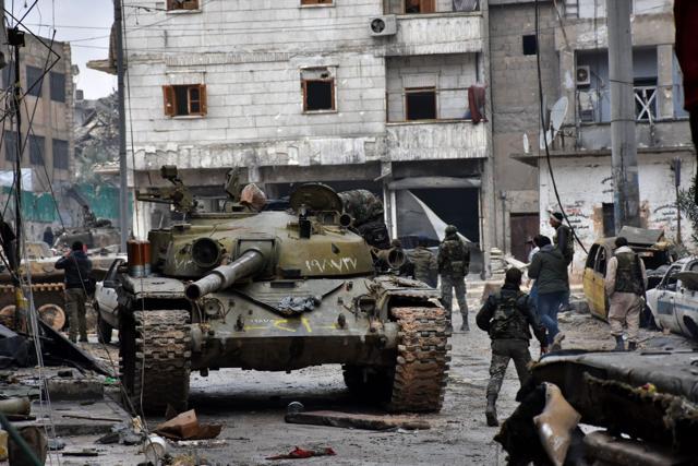 Syrian pro-government forces patrol the northern embattled city of Aleppo. (AFP file photo) Syrian pro-government forces patrol the northern embattled city of Aleppo. (AFP file photo)
