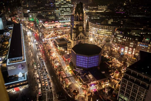 This picture taken on December 22, 2016 shows people walking between booths at the Christmas market near the Kaiser-Wilhelm-Gedaechtniskirche (Kaiser Wilhelm Memorial Church) in Berlin. (AFP) This picture taken on December 22, 2016 shows people walking between booths at the Christmas market near the Kaiser-Wilhelm-Gedaechtniskirche (Kaiser Wilhelm Memorial Church) in Berlin. (AFP)
