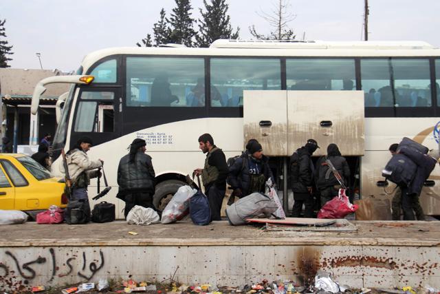 Syrian rebel fighters, arrive in the opposition-controlled Khan al-Assal region. (AFP Photo) Syrian rebel fighters, arrive in the opposition-controlled Khan al-Assal region. (AFP Photo)