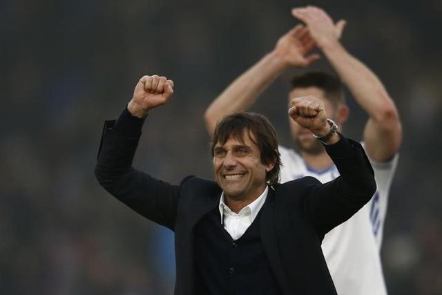 Chelsea manager Antonio Conte and Gary Cahill celebrate after their Premier League game. (REUTERS) Chelsea manager Antonio Conte and Gary Cahill celebrate after their Premier League game. (REUTERS)
