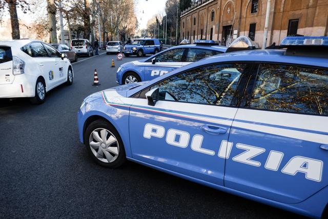 Italian police officers conduct a security check-point in a central street of Rome. (AFP Photo) Italian police officers conduct a security check-point in a central street of Rome. (AFP Photo)