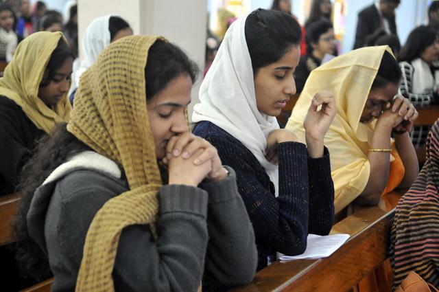 Devotees pray during the morning mass held at a church on the day of Christmas in Indore. (Arun Mondhe/ HT photo) Devotees pray during the morning mass held at a church on the day of Christmas in Indore. (Arun Mondhe/ HT photo)