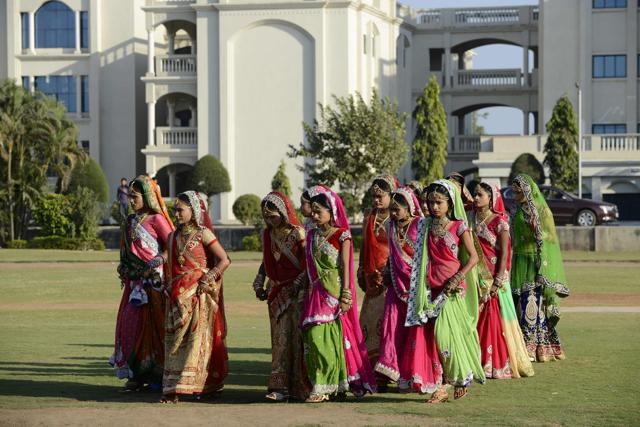 The brides-to-be arrive for the mass wedding. (AFP) The brides-to-be arrive for the mass wedding. (AFP)