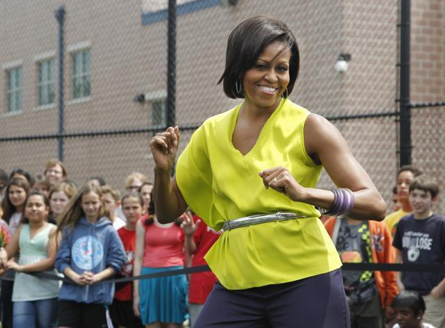 First lady Michelle Obama dances with students at Alice Deal Middle School in northwest Washington during a surprise visit for the school's Let's Move! event. (AP File Photo) First lady Michelle Obama dances with students at Alice Deal Middle School in northwest Washington during a surprise visit for the school's Let's Move! event. (AP File Photo)