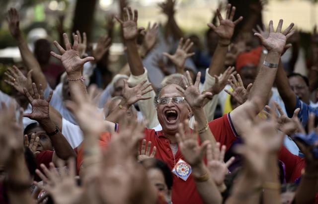 Smile, please for in this picture people are celebrating the World Laughter Day at the Nana Nani Park in Girgaon Chowpatty in Mumbai. (HT Photo)