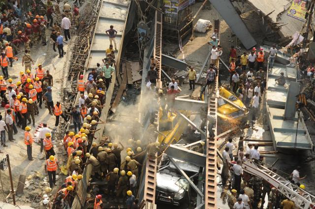 Over 20 people died and hundreds were injured when a flyover being constructed over a crowded road in Kolkata collapsed on March 31. Work on flyover had been delayed and it was over budget. HT’s photograph captured all that was wrong with the jinxed project. (Samir Jana/ HT Photo) Over 20 people died and hundreds were injured when a flyover being constructed over a crowded road in Kolkata collapsed on March 31. Work on flyover had been delayed and it was over budget. HT’s photograph captured all that was wrong with the jinxed project. (Samir Jana/ HT Photo)