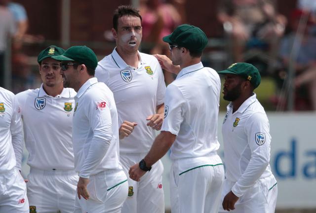 South African bowler Kyle Abbott (Centre) celebrates the dismissal of Sri Lanka batsman Dimuth Karunaratne (not in picture) during the second day of the first Test between South Africa and Sri Lanka in Port Elizabeth on Tuesday (AFP) South African bowler Kyle Abbott (Centre) celebrates the dismissal of Sri Lanka batsman Dimuth Karunaratne (not in picture) during the second day of the first Test between South Africa and Sri Lanka in Port Elizabeth on Tuesday (AFP)