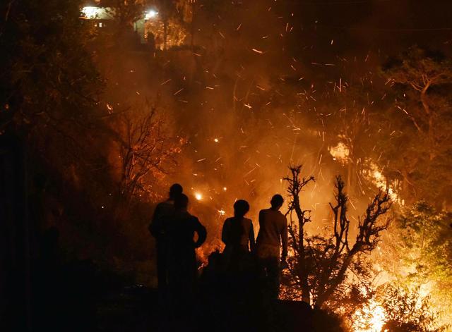 The Indian Air Force and hundreds of soldiers had to be called in when forest fires engulfed 13 districts in Uttarakhand in April-May. The hill state is notorious for pre-monsoon forest fires which are at times ignited by people to prepare the slopes for cultivation. (Arun Sharma/ HT Photo)