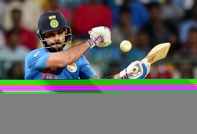 Virat Kohli plays a shot during the ICC World T20 match against Bangladesh at Chinnaswamy Stadium in Bengaluru (PTI)
