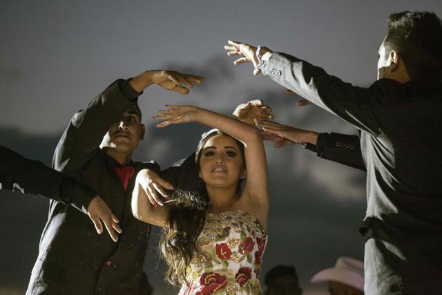 The 15-year-old dances during the celebrations for her birthday. (AFP)