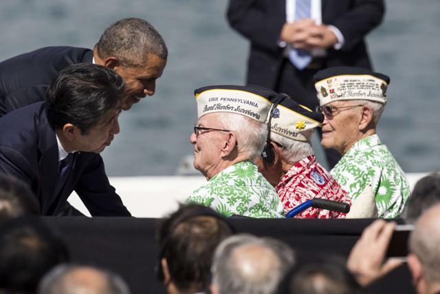 US President Barack Obama and Japanese Prime Minister Shinzo Abe greet Pearl Harbor survivors Emmet Hyland, Al Rodriguez and Sterling Cane at Joint Base Pearl Harbor Hickam's Kilo Pier in Honolulu, Hawaii, on Tuesday. (AFP) US President Barack Obama and Japanese Prime Minister Shinzo Abe greet Pearl Harbor survivors Emmet Hyland, Al Rodriguez and Sterling Cane at Joint Base Pearl Harbor Hickam's Kilo Pier in Honolulu, Hawaii, on Tuesday. (AFP)