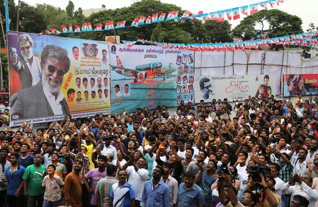 Hundreds of fans of Rajinikanth crowd outside a cinema hall to celebrate the screening of Kabali in Chennai, India, Friday, July 22, 2016. (AP) Hundreds of fans of Rajinikanth crowd outside a cinema hall to celebrate the screening of Kabali in Chennai, India, Friday, July 22, 2016. (AP)