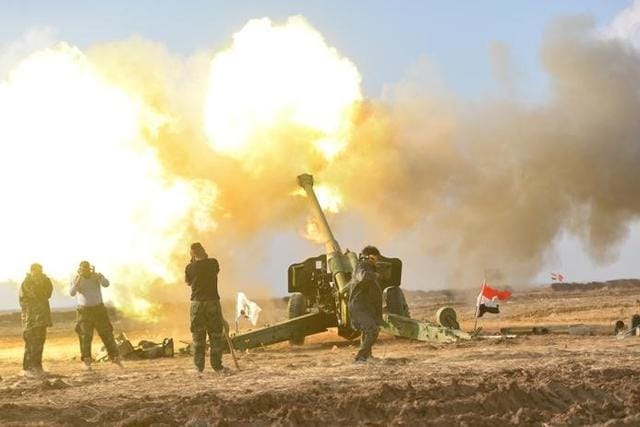 Members of Hashid Shaabi or Popular Mobilisation Forces fire towards Islamic State militant positions in west of Mosul, Iraq. (Reuters photo) Members of Hashid Shaabi or Popular Mobilisation Forces fire towards Islamic State militant positions in west of Mosul, Iraq. (Reuters photo)