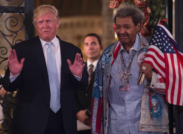 US President-elect Donald Trump, along with boxing promoter Don King, answers questions from the media after a day of meetings on December 28, 2016 at Mar-a-Lago in Palm Beach. (AFP Photo)
