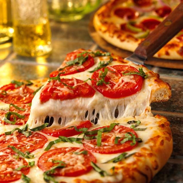 Tomato and Parmesan are making for a winning combination on pizzas (Getty Images) Tomato and Parmesan are making for a winning combination on pizzas (Getty Images)