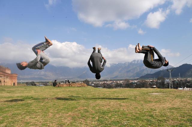 Young men in Srinagar show their talent in Parkour, ‘the art of obstacle-defeating’ in athletes which aim to run while overcoming hurdles. (Waseem Andrabi/ HT Photo) Young men in Srinagar show their talent in Parkour, ‘the art of obstacle-defeating’ in athletes which aim to run while overcoming hurdles. (Waseem Andrabi/ HT Photo)