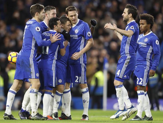 Chelsea's Eden Hazard, center left, celebrates with teammates after scoring during the Premier League match against Bournemouth. (AP) Chelsea's Eden Hazard, center left, celebrates with teammates after scoring during the Premier League match against Bournemouth. (AP)