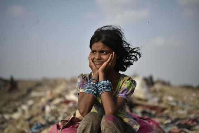 On a mountain of waste, children rummage for things that they can keep or sell. It could be a pair of sunglasses, a football or a teddy bear. Meet the children of Delhi’s Ghazipur landfill. (Ravi Choudhary/ HT Photo) On a mountain of waste, children rummage for things that they can keep or sell. It could be a pair of sunglasses, a football or a teddy bear. Meet the children of Delhi’s Ghazipur landfill. (Ravi Choudhary/ HT Photo)