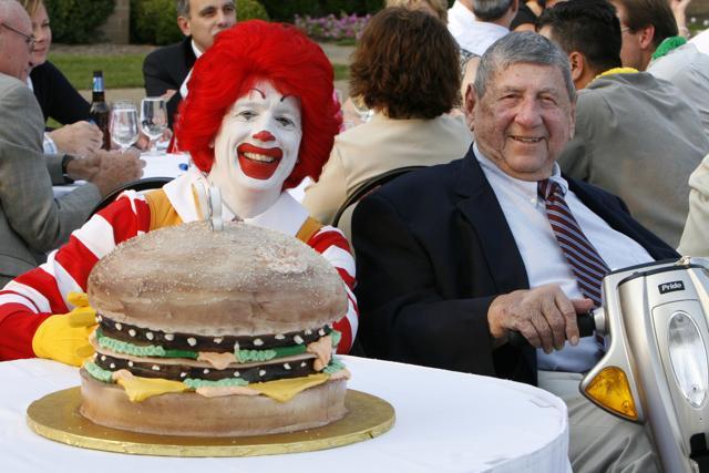 The Big Mac creator Jim Delligatti (R). He put two of everything in a single sesame bun -- two all-beef patties, sauce, lettuce, cheese, pickles, onions -- and called it the Big Mac which became the signature burger of McDonald’s. (AP) The Big Mac creator Jim Delligatti (R). He put two of everything in a single sesame bun -- two all-beef patties, sauce, lettuce, cheese, pickles, onions -- and called it the Big Mac which became the signature burger of McDonald’s. (AP)