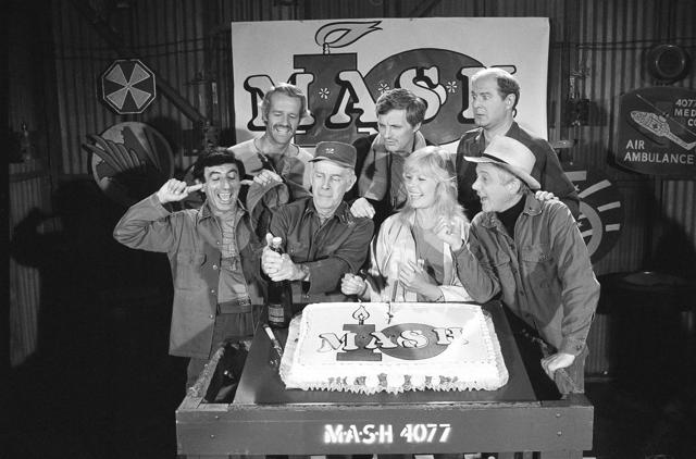 In this Oct. 22, 1981, file photo, Jamie Farr, left, plugs his ears, as cast members of MASH make noise. (L-R) Harry Morgan, Loretta Swit, William Christopher, and from back from left, Mike Farrell Alan Alda and David Ogden Stiers. (AP) In this Oct. 22, 1981, file photo, Jamie Farr, left, plugs his ears, as cast members of MASH make noise. (L-R) Harry Morgan, Loretta Swit, William Christopher, and from back from left, Mike Farrell Alan Alda and David Ogden Stiers. (AP)