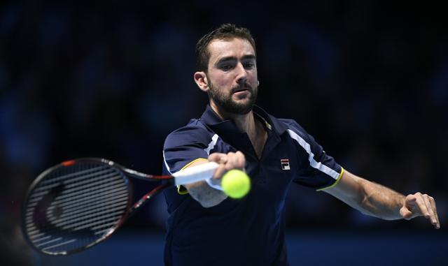 Marin Cilic in action during his round robin match against Great Britain's Andy Murray. (REUTERS) Marin Cilic in action during his round robin match against Great Britain's Andy Murray. (REUTERS)