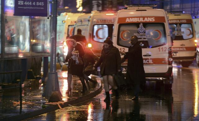 People leave as medics and security officials work at the scene after an attack at a popular nightclub in Istanbul. (AP Photo) People leave as medics and security officials work at the scene after an attack at a popular nightclub in Istanbul. (AP Photo)