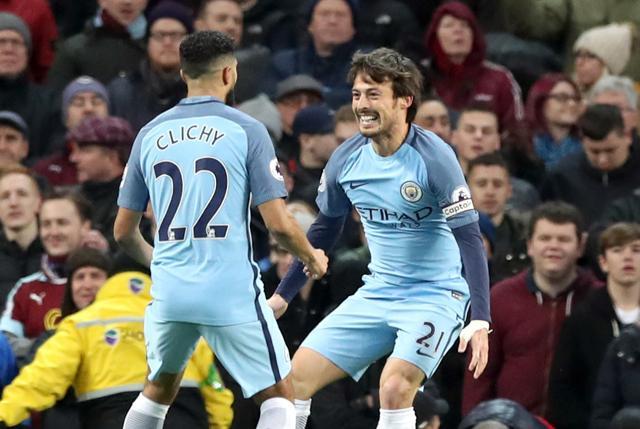Manchester City's Gael Clichy, left, celebrates scoring his side's first goal of the game with teammate David Silva. (AP) Manchester City's Gael Clichy, left, celebrates scoring his side's first goal of the game with teammate David Silva. (AP)