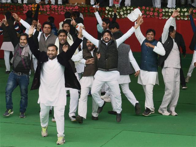 SP workers celebrate after the announcement. The Akhilesh faction claims that over 200 of the party’s 229 MLAs, around 30 MLCs and the majority of office-bearers of district units were present at the event. (PTI) SP workers celebrate after the announcement. The Akhilesh faction claims that over 200 of the party’s 229 MLAs, around 30 MLCs and the majority of office-bearers of district units were present at the event. (PTI)