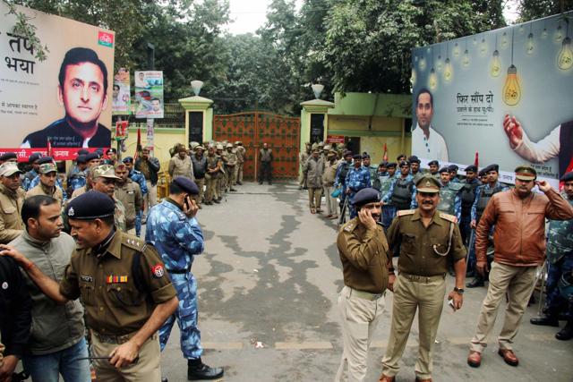 Heavy deployment of UP police and contingents of PAC outside the party office on Vikramadiyta Marg, where Shivpal supporters give securitymen a tough time in controlling the crowd. (PTI) Heavy deployment of UP police and contingents of PAC outside the party office on Vikramadiyta Marg, where Shivpal supporters give securitymen a tough time in controlling the crowd. (PTI)